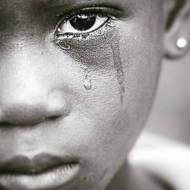 A girl crying - I must GRIEVE