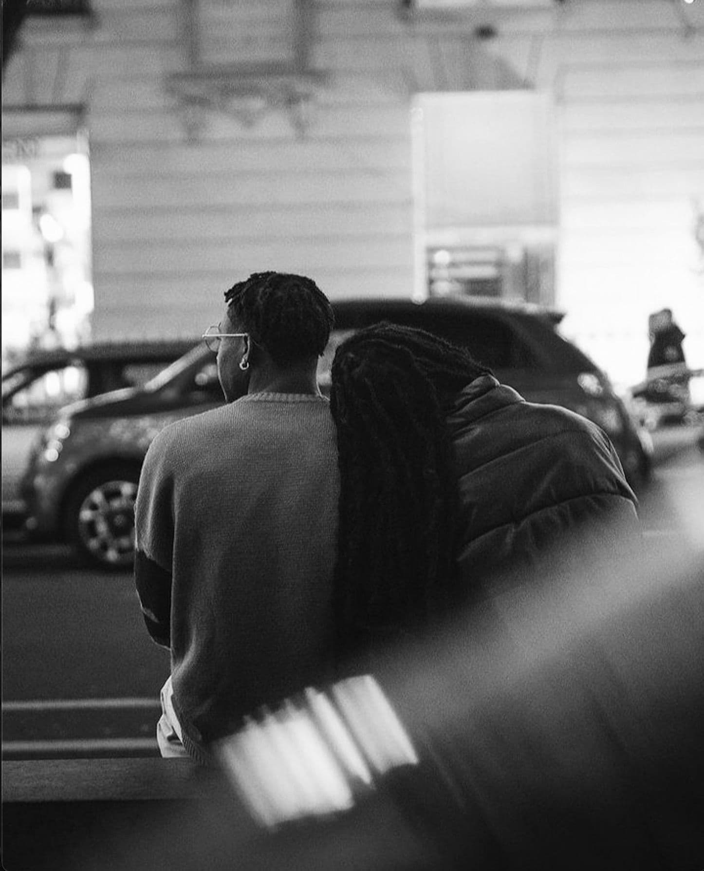 Lovers sitting together - Strangers